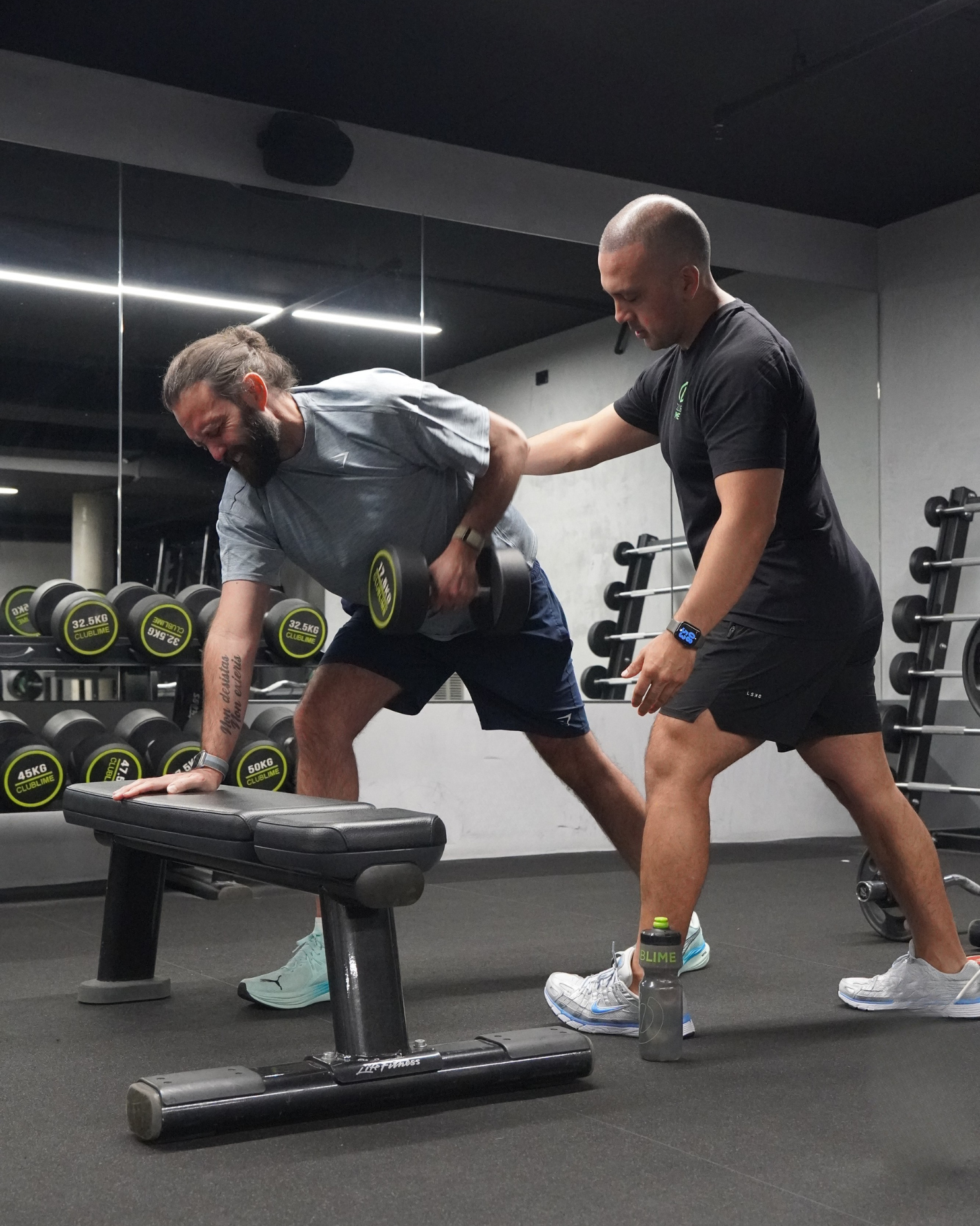 Carlos coaching dumbbell row